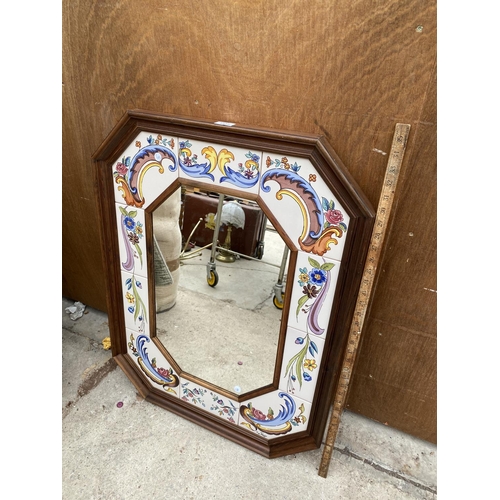 1218 - A PAIR OF MIRRORS TO INCLUDE A LARGE WOODEN TILE MIRROR AND A BEVELED GILT OVAL MIRROR