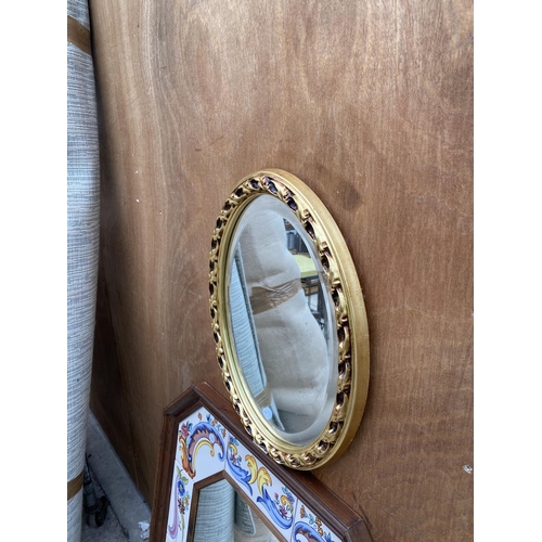 1218 - A PAIR OF MIRRORS TO INCLUDE A LARGE WOODEN TILE MIRROR AND A BEVELED GILT OVAL MIRROR