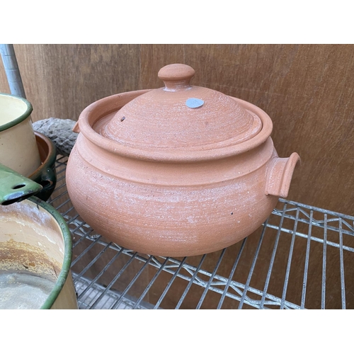 1226 - A COLLECTION OF ENAMEL PANS, A TERRACOTTA COOKING POT AND TWO FURTHER DISHES