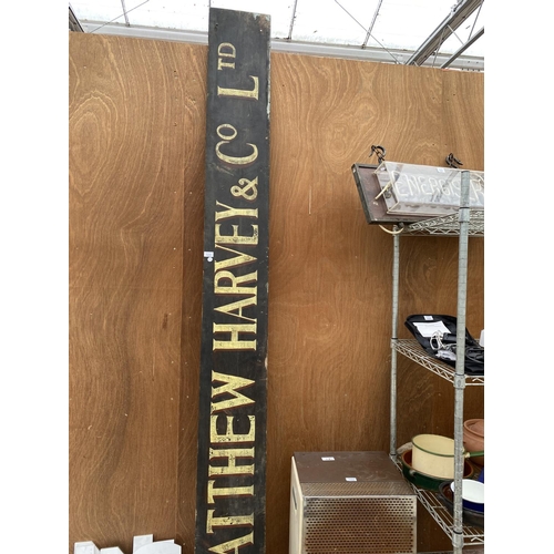 1231 - A VINTAGE LARGE WOODEN 'MATTHEW HARVEY AND CO LTD' SIGN (L:210CM W:28CM)