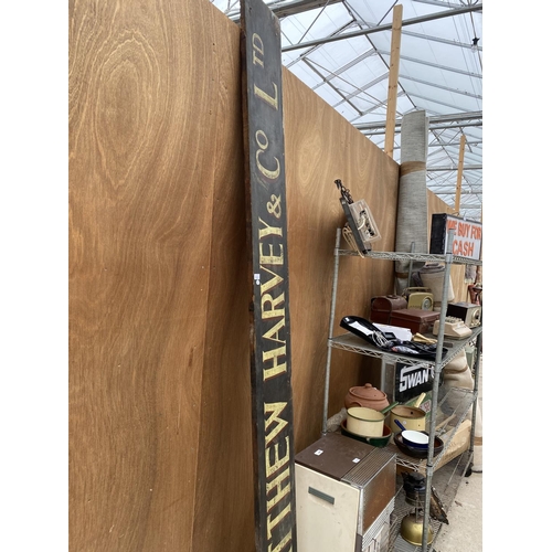 1231 - A VINTAGE LARGE WOODEN 'MATTHEW HARVEY AND CO LTD' SIGN (L:210CM W:28CM)