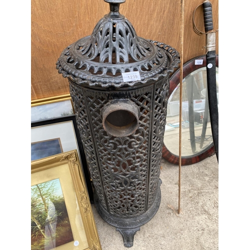 1239 - A VINTAGE CAST IRON HEATER