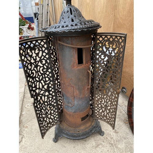 1239 - A VINTAGE CAST IRON HEATER