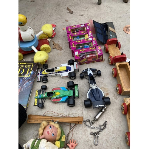 1275 - A LARGE COLLECTION OF VINTAGE CHILDRENS TOYS TO INCLUDE CARS, PUPPETS ETC