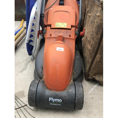 1297 - AN ELECTRIC FLYMO ROLLERMO, ALONG WITH A BOSCH ELECTRIC HEDGE CUTTER AND FURTHER GARDEN TOOLS ETC