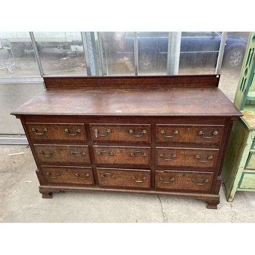 1901 - A GEORGE III OAK AND CROSSBANDED LANCASHIRE CHEST WITH FOUR SHAM DRAWERS, TWO BASE DRAWERS, ON OGEE ... 