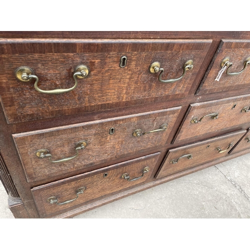 1901 - A GEORGE III OAK AND CROSSBANDED LANCASHIRE CHEST WITH FOUR SHAM DRAWERS, TWO BASE DRAWERS, ON OGEE ... 