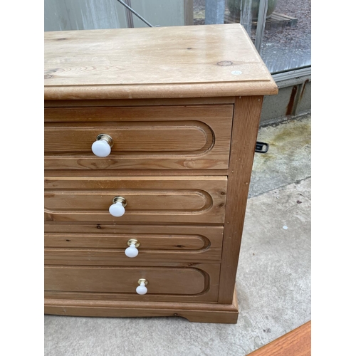 1915 - A MODERN PINE CHEST OF FOUR SHORT AND TWO LONG DRAWERS, 48