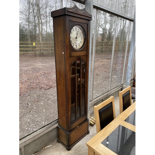 1916 - AN EARLY 20TH CENTURY OAK HALL LONGCASE CLOCK WITH GLASS DOOR AND THREE WEIGHTS