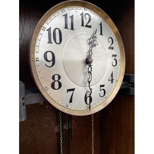 1916 - AN EARLY 20TH CENTURY OAK HALL LONGCASE CLOCK WITH GLASS DOOR AND THREE WEIGHTS