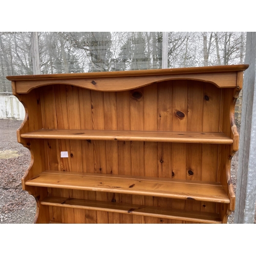 1919 - A MODERN PINE DRESSER WITH PLATE RACK, 43