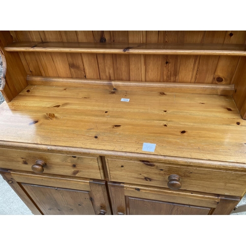 1919 - A MODERN PINE DRESSER WITH PLATE RACK, 43