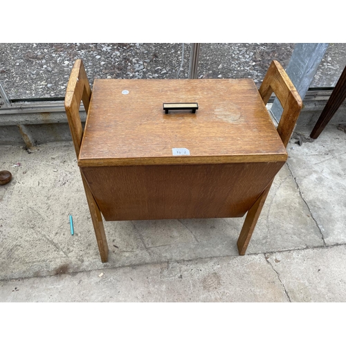 1932 - AN EARLY 20TH CENTURY OAK SEWING BOX