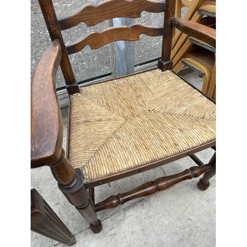 1934 - AN 18TH CENTURY STYLE LADDERBACK RUSH SEATED ELBOW CHAIR