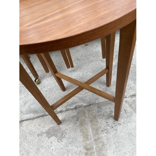 1936 - A RETRO TEAK NEST OF FIVE TABLES, FOUR BEING DROP-LEAF