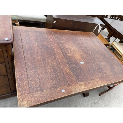 1948 - AN EARLY 20TH CENTURY OAK DRAW LEAF DINING TABLE