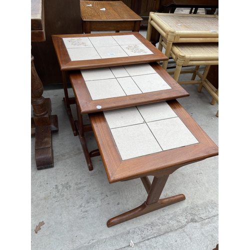 1949 - A NEST OF RETRO TEAK AND TILE INSET TABLES