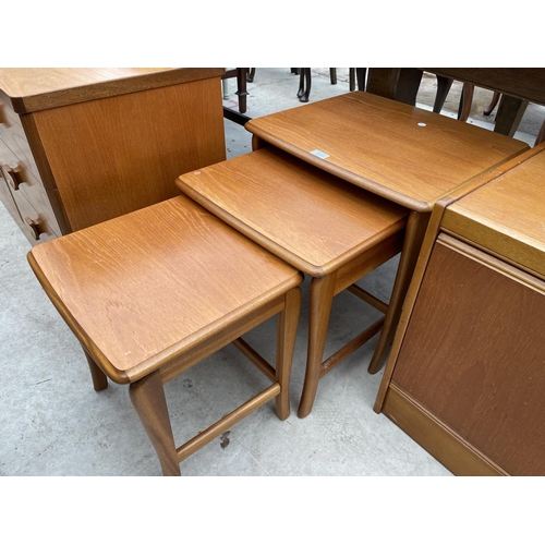 1954 - A RETRO TEAK NEST OF THREE TABLES