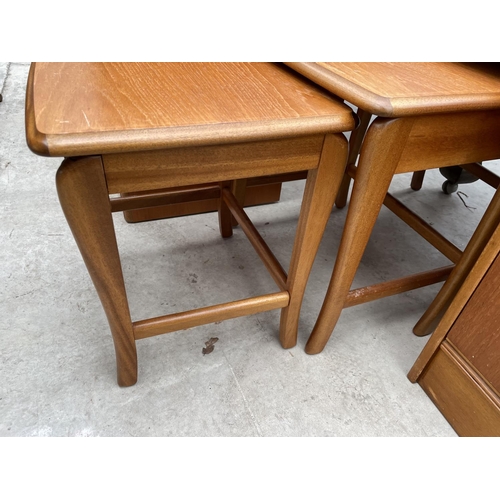 1954 - A RETRO TEAK NEST OF THREE TABLES