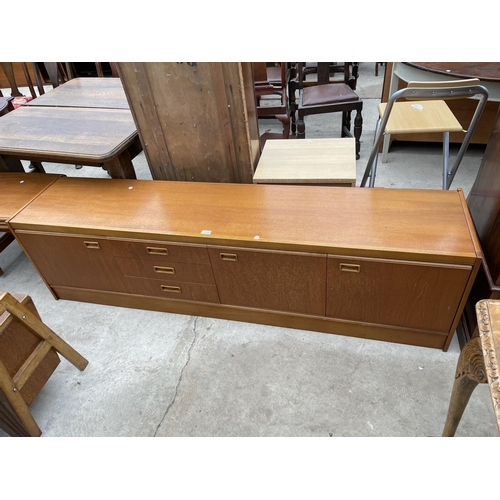 1955 - A RETRO JENTIQUE TEAK SIDEBAORD ENCLOSING THREE DRAWERS AND THREE CUPBOARDS