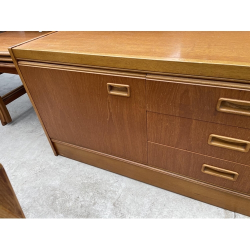 1955 - A RETRO JENTIQUE TEAK SIDEBAORD ENCLOSING THREE DRAWERS AND THREE CUPBOARDS