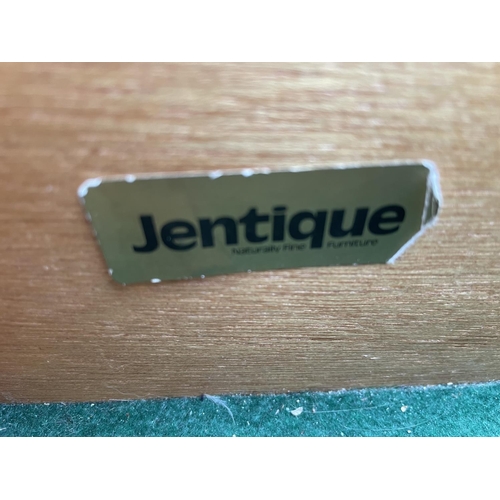 1955 - A RETRO JENTIQUE TEAK SIDEBAORD ENCLOSING THREE DRAWERS AND THREE CUPBOARDS