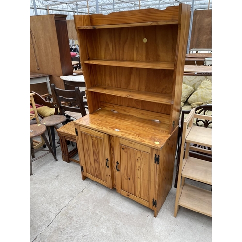 1960 - A MODERN PINE DRESSER WITH PLATE RACK, 36