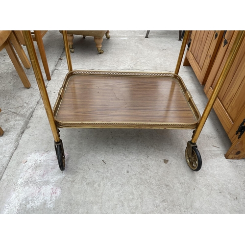 1963 - A MID 20TH CENTURY TWO TIER GALLERIED METALWARE TROLLEY