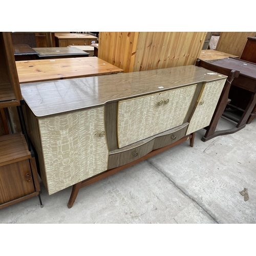 1965 - A RETRO CREAMY WALNUT EFFECT SIDEBOARD/COCTAIL CABINET, ENCLOSING FOUR CUPBOARDDS AND TWO DRAWERS, 6... 