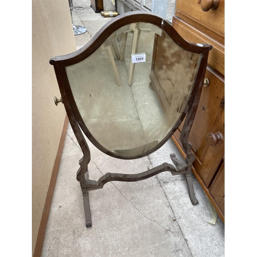 1969 - AN EDWARDIAN MAHOGANY AND INLAID SHIELD SHAPED SWING FRAME VANITY MIRROR