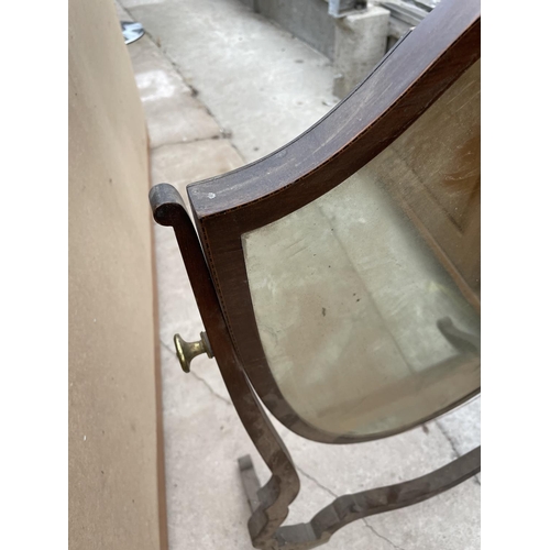 1969 - AN EDWARDIAN MAHOGANY AND INLAID SHIELD SHAPED SWING FRAME VANITY MIRROR