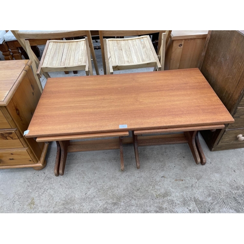 1975 - A RETRO G-PLAN STYLE NEST OF THREE TABLES