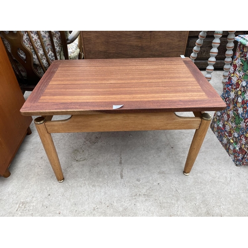 1978 - A RETRO G-PLAN E GOMME TEAK COFFEE TABLE ON TAPERED LEGS, 29x19