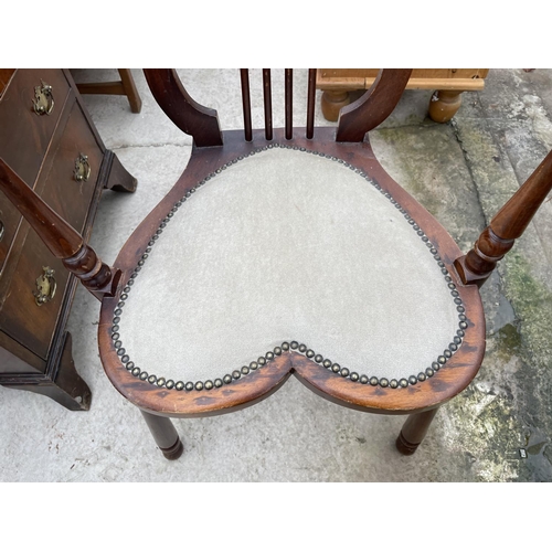 1980 - AN EDWARDIAN MAHOGANY ELBOW CHAIR WITH HEART SHAPED SEAT AND HARP STYLE BACK