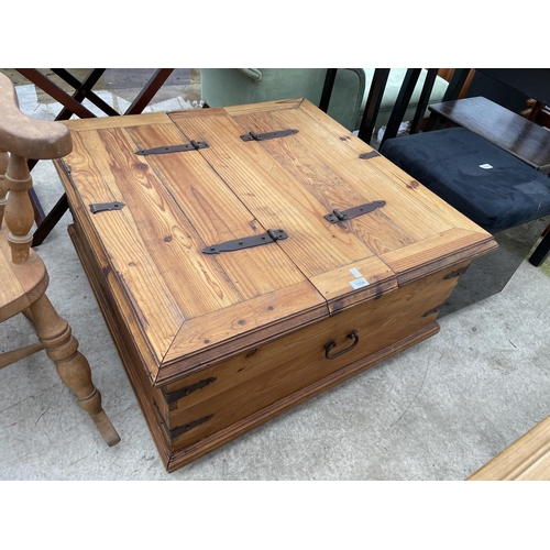 1984 - A MEXICAN PINE STORAGE CHEST WITH METEAL STRAPS