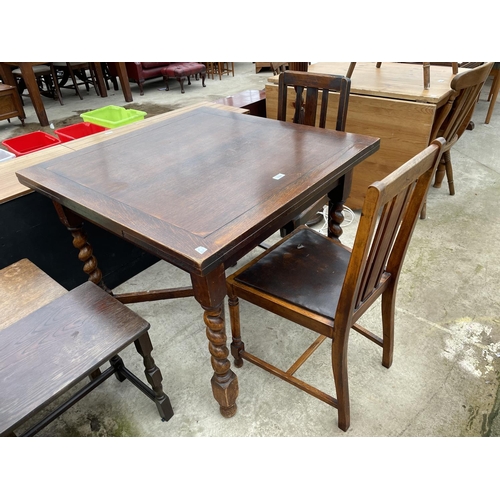 1986 - AN OAK DRAW-LEAF TABLE AND TWO CHAIRS