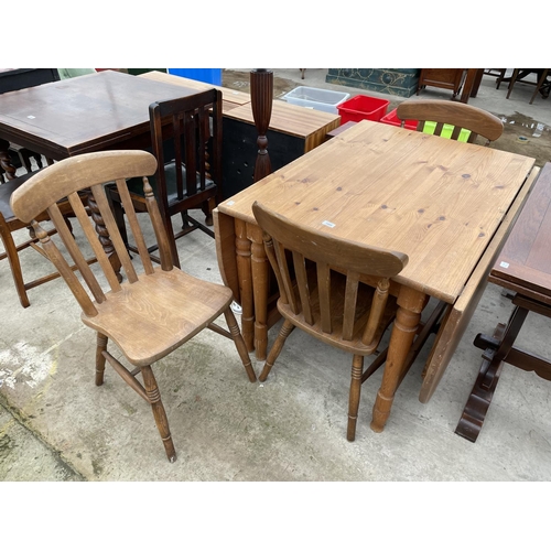 1988 - A PINE DROP-LEAF KITCHEN TABLE AND THREE CHAIRS