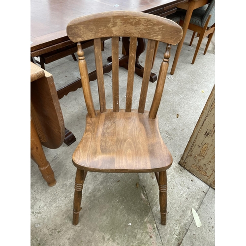 1988 - A PINE DROP-LEAF KITCHEN TABLE AND THREE CHAIRS