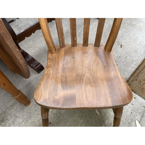 1988 - A PINE DROP-LEAF KITCHEN TABLE AND THREE CHAIRS