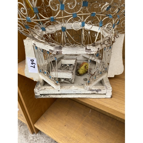 1330 - A VINTAGE AND ORNATE DECORATIVE BIRD CAGE