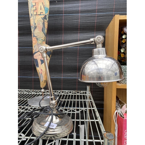 1338 - A SILVER METAL ANGLEPOISE STYLE DESK LAMP AND AN DECORATIVE LEG