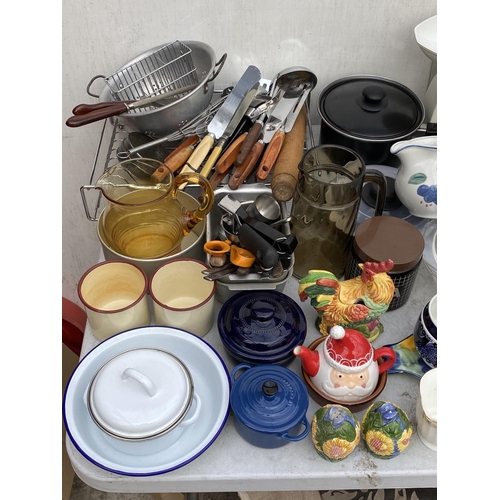 1352 - A LARGE ASSORTMENT OF CERAMIC AND GLASS WARE TO INCLUDE KITCHEN SCALES, POTS AND PANS, LARGE SALAD B... 