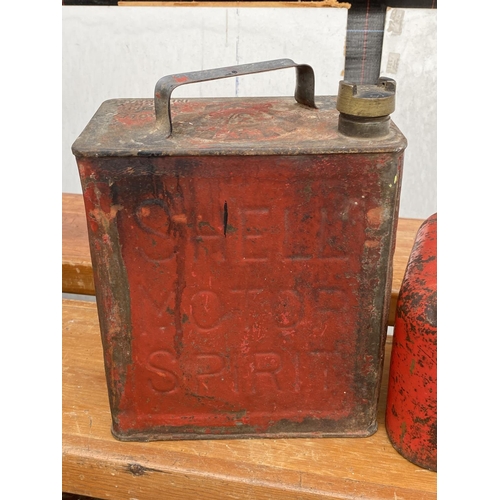 1377 - THREE VINTAGE PETROL CANS TO INCLUDE AN ESSO BLUE PARAFFIN CAN ETC