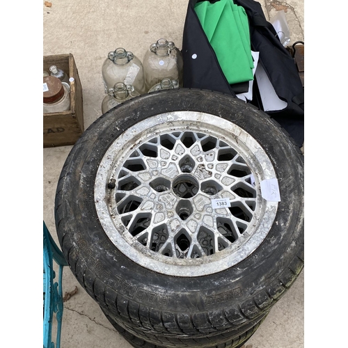 1383 - FOUR FORD RIMS WITH RADIAL TYRES