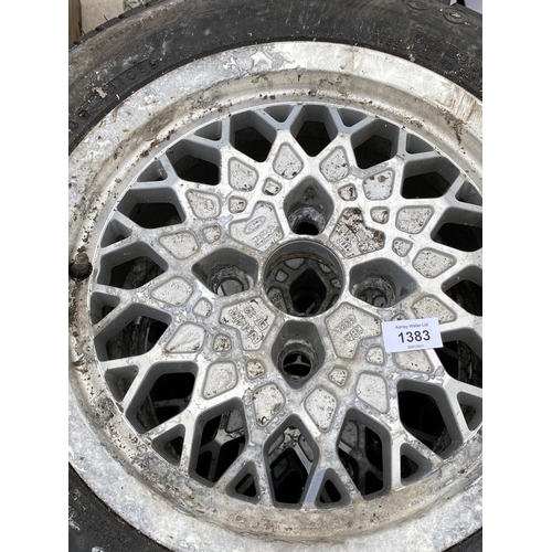 1383 - FOUR FORD RIMS WITH RADIAL TYRES