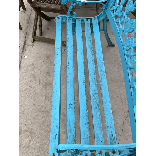 1384 - A BLUE GARDEN BENCH WITH CAST BENCH ENDS AND FLORAL DETAIL