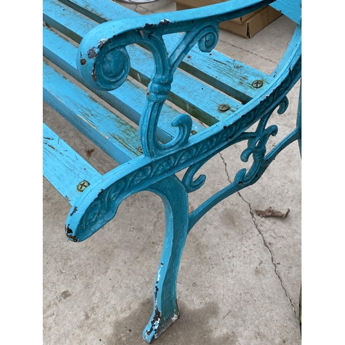 1384 - A BLUE GARDEN BENCH WITH CAST BENCH ENDS AND FLORAL DETAIL