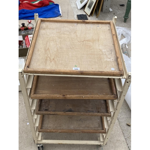 1426 - A VINTAGE POTTERS TROLLEY WITH FOUR SHELVES