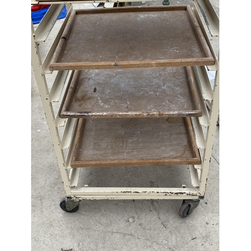 1427 - A VINTAGE POTTERS TROLLEY WITH FOUR SHELVES