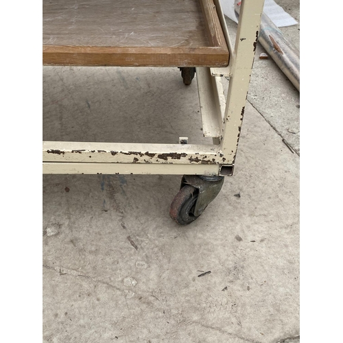 1427 - A VINTAGE POTTERS TROLLEY WITH FOUR SHELVES